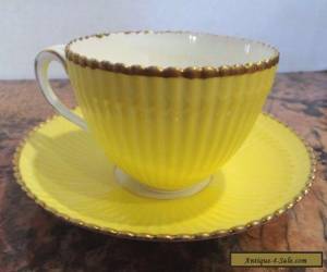 Item CAULDON BROWN WESTHEAD MOORE & CO YELLOW GOLD TEACUP & SAUCER  for Sale