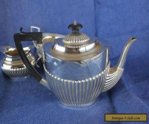 Item Antique hallmarked silver teapot plus an E.P. milk jug and sugar bowl.  for Sale
