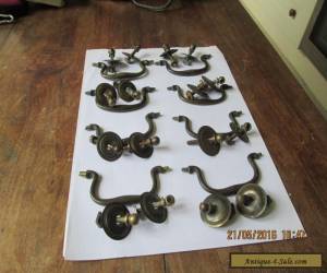 Item set of 8 antique brass swan neck handles S1685 for Sale
