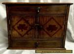 EARLY 20TH CENTURY  OAK TABLE CABINET - ENCLOSING A BRASS RACK for Sale