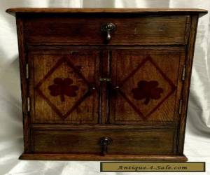 Item EARLY 20TH CENTURY  OAK TABLE CABINET - ENCLOSING A BRASS RACK for Sale