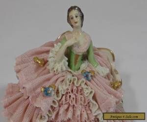 Item   DRESDEN LACE FIGURINE OF A WELL DRESSED WOMAN ON A SETTEE for Sale