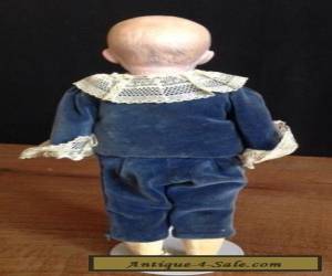 Item Gebruder Heubach Pouty Boy In Victorian Clothes for Sale