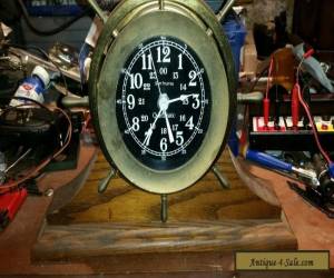Item Helmsman ship clock for Sale