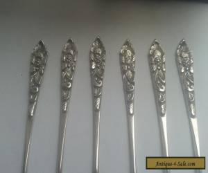 Item a set of vintage/antique solid siver  spoons for Sale