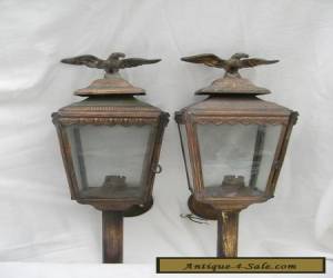 Item PAIR OF OLD METAL WALL LAMPS, WITH AN  IMPERIAL EAGLE FINIAL. for Sale
