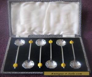 Item a boxed set of 6 metal coffee bean spoons for Sale
