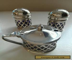 Item VINTAGE SILVER PLATED SALTS WITH CONDIMENT AND BLUE GLASS LINERS  for Sale