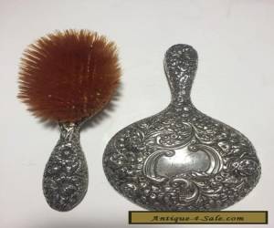 Item GORHAM ANTIQUE STERLING SILVER REPOUSSE HAND MIRROR & BRUSH, c. 1890 for Sale