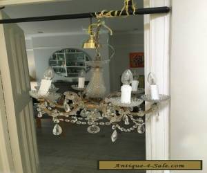 Item antique vintage  brass and cut glass crystals chandelier  for Sale