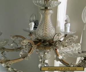 Item antique vintage  brass and cut glass crystals chandelier  for Sale