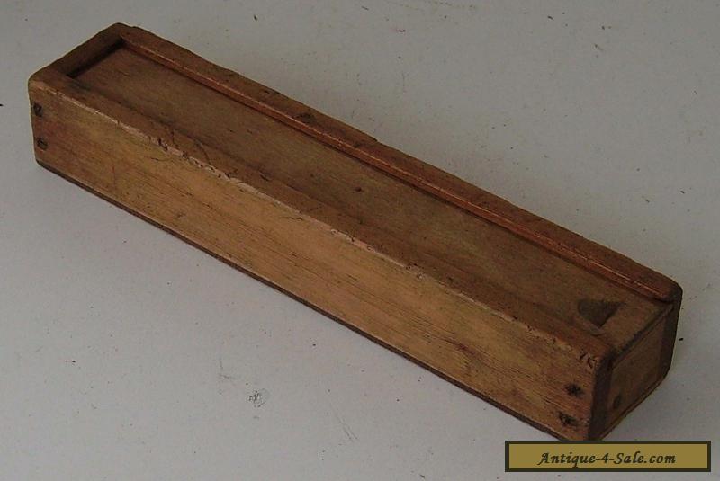 long thin wooden box