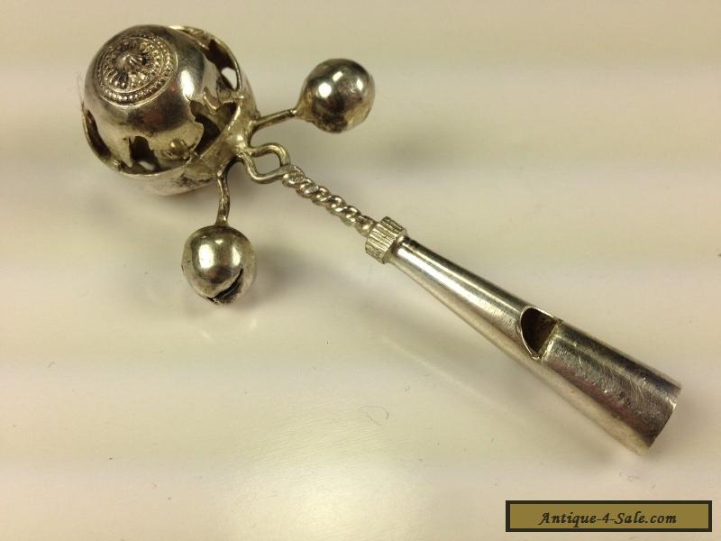 antique silver baby rattle