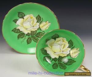 Item PARAGON HUGE WHITE ROSES GREEN TEA CUP AND SAUCER for Sale