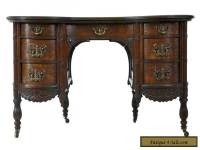 LATE 19TH CENTURY CARVED OAK KIDNEY SHAPED WRITING DESK