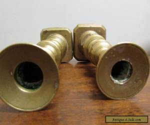 Item Two Victorian Brass Candle sticks irregular pair pop outs for Sale