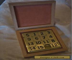 Item A VINTAGE WOODEN BOX , 4" SQUARE, BRASS NUMBER GAME INSIDE . for Sale