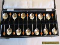 set of 12 silverplated coffee spoons in a box