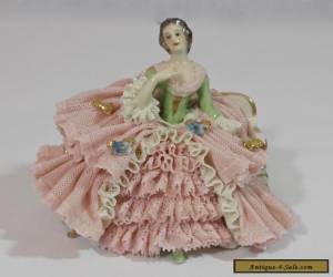   DRESDEN LACE FIGURINE OF A WELL DRESSED WOMAN ON A SETTEE for Sale