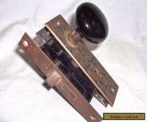 Item DP1- ANTIQUE DOOR LATCH ASSEMBLY WITH ORNATE ESCUTCHEONS & BLACK PORCELAIN KNOBS for Sale