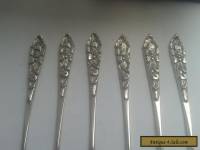 a set of vintage/antique solid siver  spoons