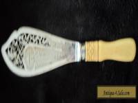 LARGE VERY ORNATE VINTAGE SOLID SILVER KNIFE.