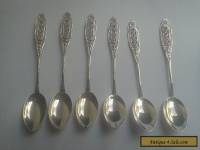 a set of vintage/antique  silver spoons