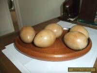 A FABULOUS SET OF TURNED WOODEN EGGS AND A CARVED WOODEN BOWL BY DON ALEXANDER