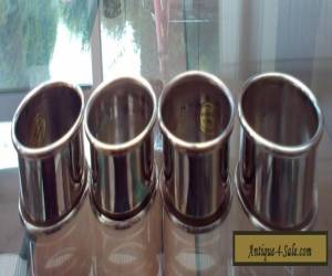A SET OF 4 VINTAGE SILVER PLATED NAPKIN RINGS for Sale
