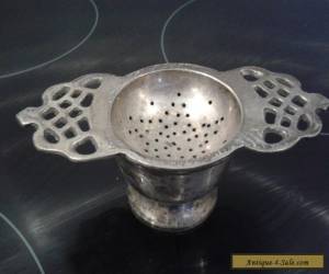 Antique silver-plate tea-strainer with holder for Sale
