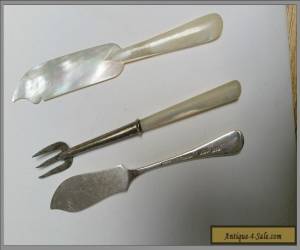 Sterling silver and mother of pearl pickle fork and two butter spreaders for Sale