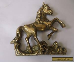 Item  BRASS HORSE FROM THE TOP OF A VERY OLD WALL CLOCK  for Sale