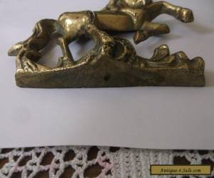 Item  BRASS HORSE FROM THE TOP OF A VERY OLD WALL CLOCK  for Sale