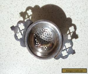 Item TEA STRAINER - ANTIQUE / VINTAGE - SILVER PLATE(?) for Sale