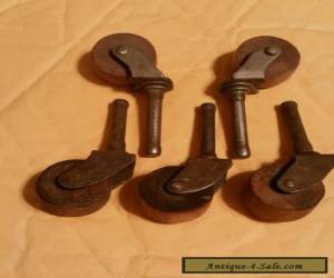 Item Antique furniture casters with wood wheels lot of 5 for Sale