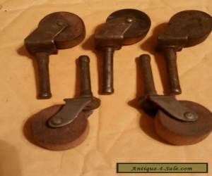 Item Antique furniture casters with wood wheels lot of 5 for Sale