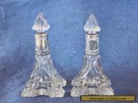 Pair of antique silver necked crystal perfume bottles.