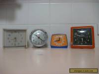 4 vintage alarm clocks