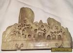 Carved Soapstone ornament showing a pagoda and mountain scene for Sale