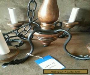 Item  VINTAGE WOOD AND BLACK IRON METAL CHANDELIER  for Sale