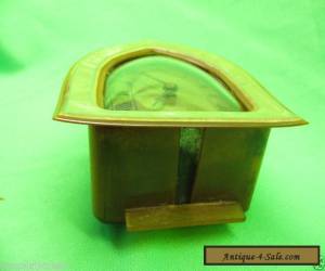 Item Table Mantle Bedside Clock Bakelite or Early Plastic Celluloid Resin Has Bracket for Sale